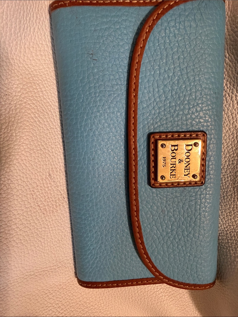 Dooney & Bourke Light Blue Pebbled Leather Wallet with Brown Trim